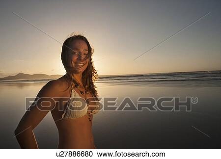 Portrait of woman on beach smiling, Lanzarote, Canary Islands, Spain View Large Photo Image Stock Image - Portrait of woman on beach smiling, Lanzarote, Canary Islands, Spain. Fotosearch