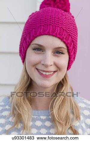 Portrait of young woman in wooly hat View Large Photo Image Stock Image - Portrait of young woman in wooly hat. Fotosearch