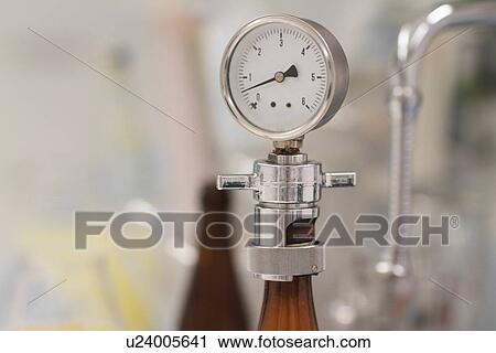 Stock Image - Pressure gauge in brewery. Fotosearch