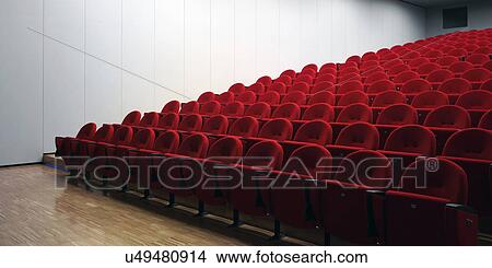 Red chairs in empty auditorium View Large Photo Image Picture - Red chairs in empty auditorium. Fotosearch