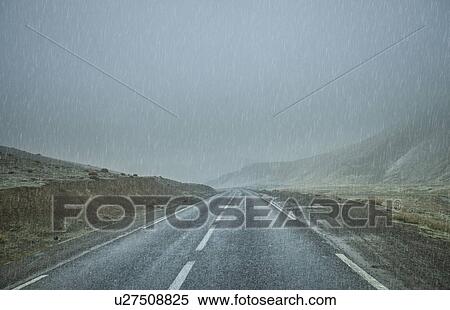 Road in rain, Atlas Mountains, Morocco View Large Photo Image Stock Photography - Road in rain, Atlas Mountains, Morocco. Fotosearch