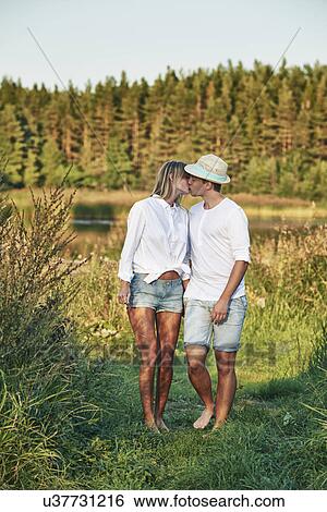 Romantic young couple kissing, Gavle, Sweden View Large Photo Image Stock Photograph - Romantic young couple kissing, Gavle, Sweden. Fotosearch