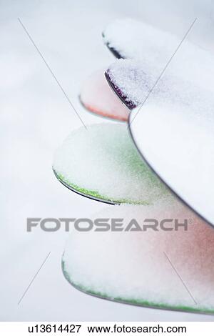 Stock Photo - Snow covered skis. Fotosearch