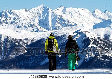 Snowboarders in Serre Chevalier, Briancon, France View Large Photo Image Stock Photo - Snowboarders in Serre Chevalier, Briancon, France. Fotosearch