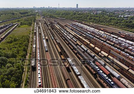 View of rail lines and freight, Munich, Bavaria, Germany View Large Photo Image Stock Image - View of rail lines and freight, Munich, Bavaria, Germany. Fotosearch