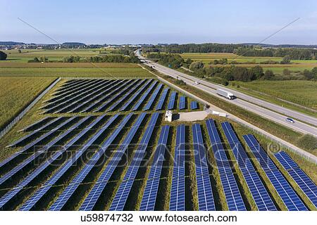 View of road and solar power panels, Munich, Bavaria, Germany View Large Photo Image Stock Image - View of road and solar power panels, Munich, Bavaria, Germany. Fotosearch