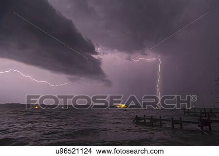 View of storm and lightning on Lake Starnberg, Bavaria, Germany View Large Photo Image Picture - View of storm and lightning on Lake Starnberg, Bavaria, Germany. Fotosearch