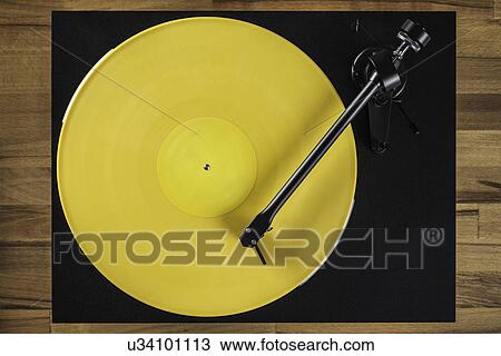 Stock Image - Vintage turntable, high angle. Fotosearch