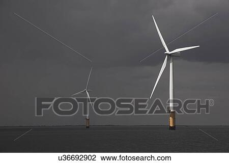 Wind turbines in ocean View Large Photo Image Stock Image - Wind turbines in ocean. Fotosearch