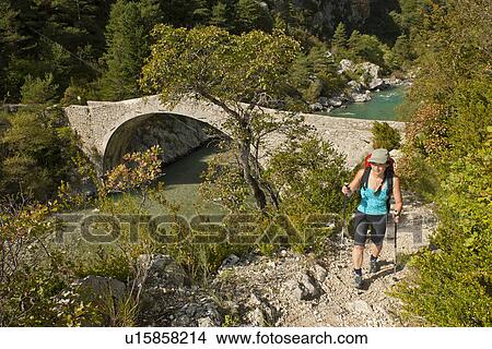 Picture - Woman hiking, Canyon du Verdon, Provence, France. Fotosearch