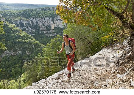 Woman hiking Canyon du Verdon, Provence, France View Large Photo Image Stock Photo - Woman hiking Canyon du Verdon, Provence, France. Fotosearch