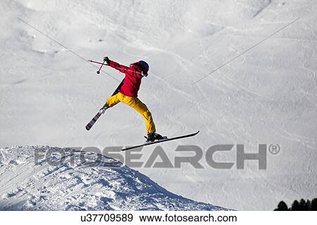 Woman ski jumping in Kuhtai, Tirol, Austria View Large Photo Image Stock Photo - Woman ski jumping in Kuhtai, Tirol, Austria. Fotosearch