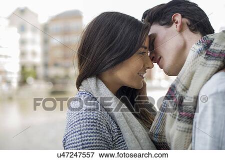 Young couple face to face View Large Photo Image Stock Photo - Young couple face to face. Fotosearch