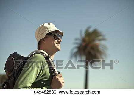 Young man with backpack, Cape Town, South Africa View Large Photo Image Stock Image - Young man with backpack, Cape Town, South Africa. Fotosearch