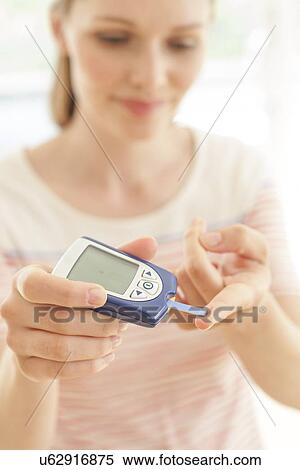 Blood glucose test View Large Photo Image Stock Photography - Blood glucose test. Fotosearch