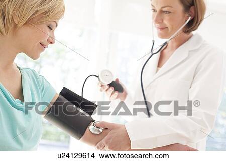 Blood pressure measurement View Large Photo Image Picture - Blood pressure measurement. Fotosearch