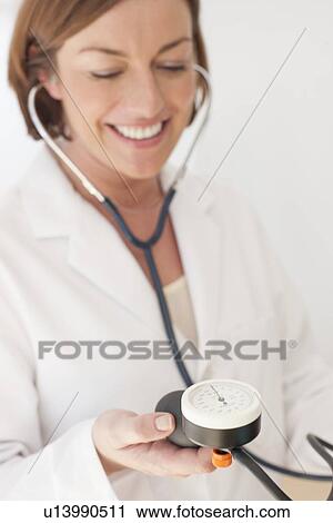 Blood pressure measurement View Large Photo Image Stock Image - Blood pressure measurement. Fotosearch