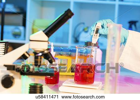 Stock Image - Chemistry research. Fotosearch