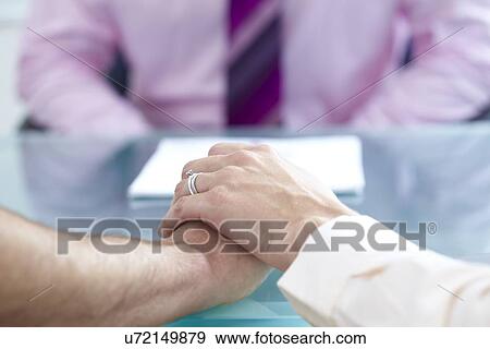 Stock Photo - Consultation. Fotosearch