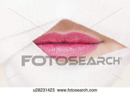 Stock Image - Cosmetic surgery, conceptual image. Fotosearch
