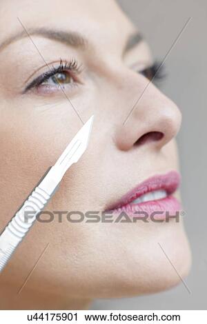 Cosmetic surgery, conceptual image View Large Photo Image Stock Image - Cosmetic surgery, conceptual image. Fotosearch