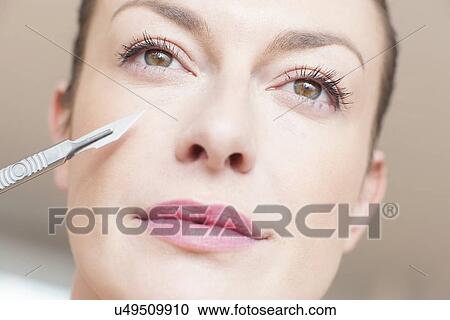 Cosmetic surgery, conceptual image View Large Photo Image Stock Image - Cosmetic surgery, conceptual image. Fotosearch