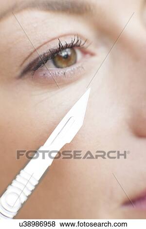 Cosmetic surgery, conceptual image View Large Photo Image Stock Photo - Cosmetic surgery, conceptual image. Fotosearch
