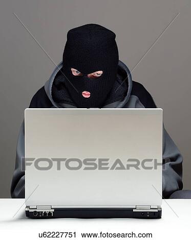 Stock Image - Cyber crime, conceptual image. Fotosearch