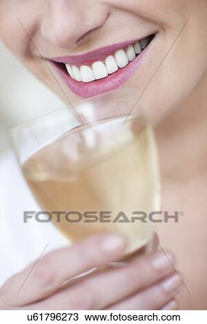 Glass of white wine View Large Photo Image Stock Image - Glass of white wine. Fotosearch