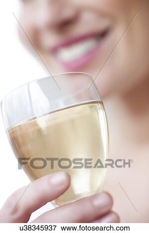 Glass of white wine View Large Photo Image Stock Photo - Glass of white wine. Fotosearch
