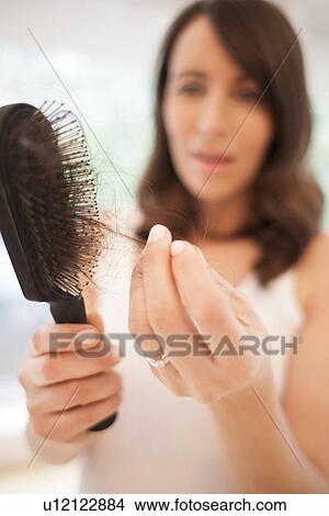 Picture - Hair loss in pregnancy. Fotosearch