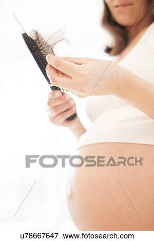 Stock Photo - Hair loss in pregnancy. Fotosearch