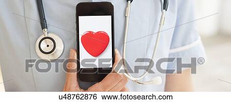 Stock Photograph - Heart health, conceptual image. Fotosearch