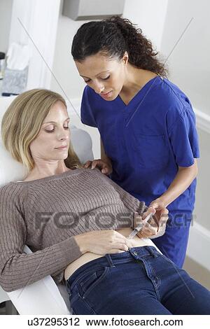 Hormone injection for IVF View Large Photo Image Stock Image - Hormone injection for IVF. Fotosearch