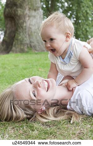 Mother and baby daughter View Large Photo Image Picture - Mother and baby daughter. Fotosearch
