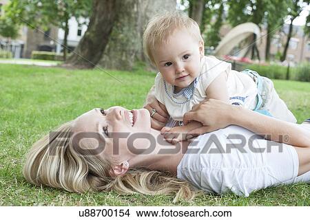 Mother and baby daughter View Large Photo Image Picture - Mother and baby daughter. Fotosearch