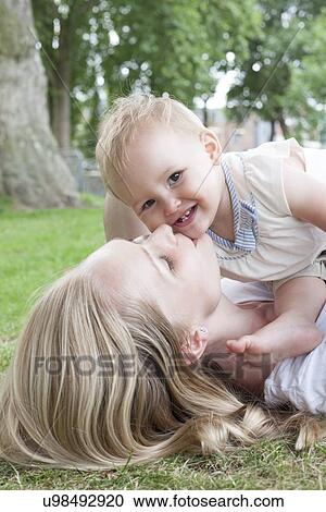 Mother and baby daughter View Large Photo Image Stock Image - Mother and baby daughter. Fotosearch