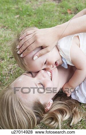 Mother and baby daughter View Large Photo Image Stock Photo - Mother and baby daughter. Fotosearch