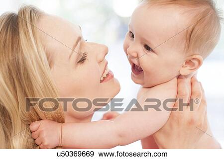 Mother and baby daughter View Large Photo Image Stock Photo - Mother and baby daughter. Fotosearch