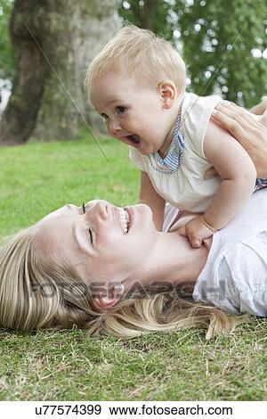 Mother and baby daughter View Large Photo Image Stock Photo - Mother and baby daughter. Fotosearch