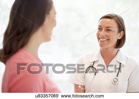 Stock Photo - Nurse and patient. Fotosearch