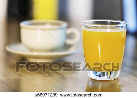 Stock Photo - Orange juice and coffee. Fotosearch