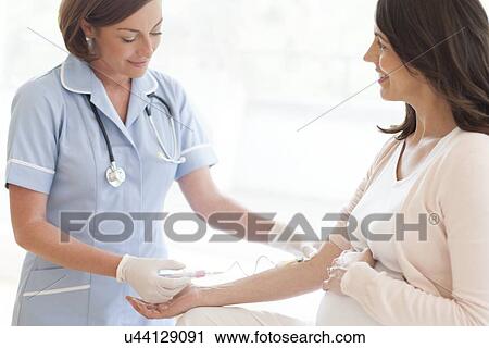 Stock Image - Pregnancy check-up. Fotosearch