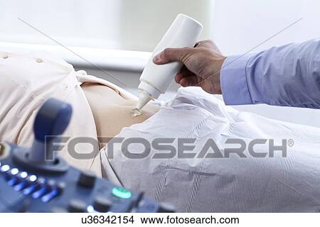 Picture - Pregnancy ultrasound scan. Fotosearch
