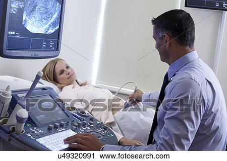 Stock Image - Pregnancy ultrasound scan. Fotosearch