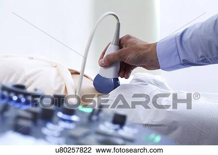 Stock Image - Pregnancy ultrasound scan. Fotosearch
