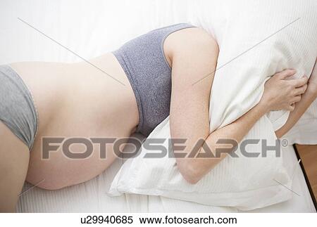 Pregnant woman sleeping View Large Photo Image Stock Photography - Pregnant woman sleeping. Fotosearch