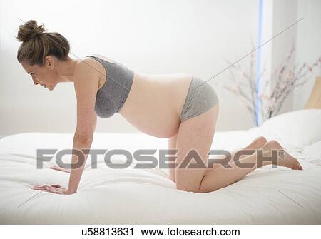 Stock Image - Pregnant woman. Fotosearch