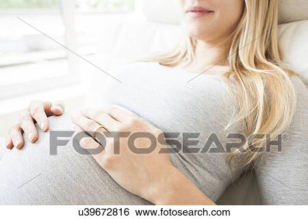 Stock Photograph - Pregnant woman. Fotosearch