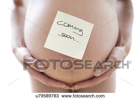Pregnant woman's abdomen View Large Photo Image Stock Image - Pregnant woman's abdomen. Fotosearch
